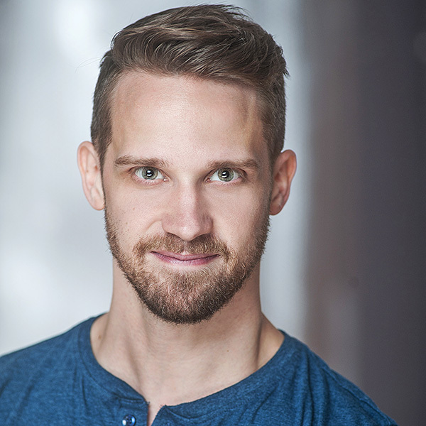 Headshot of Adam Sergison